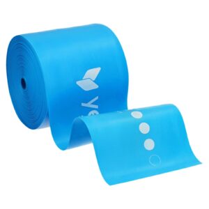 blue rolled yoga mat with a white logo, partially unrolled to reveal white dotted pattern on a bright blue surface