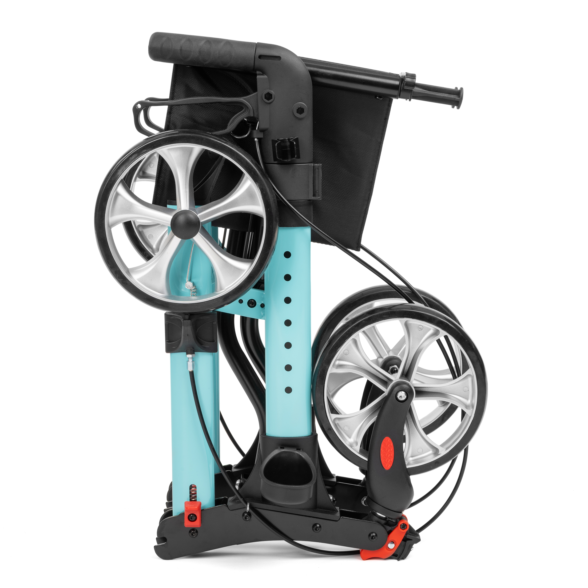 rolator_yola_7 - fizio trgovina close-up of a folding wheelchair showing a large silver rear wheel, turquoise frame, and footrest/brake area.