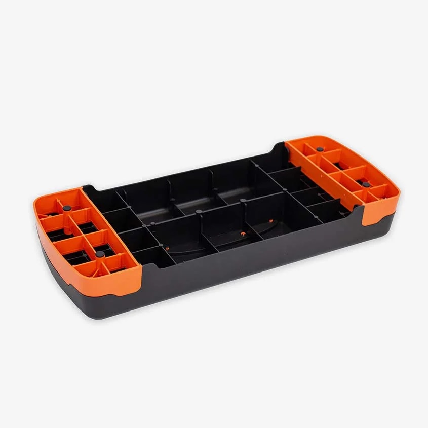 steper_za_aerobiko_7 - fizio trgovina plastic tool tray with orange end sections and black compartments for organizing small parts and tools.