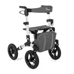 Side view of a grey padded wheelchair with large rear wheels, footrests, and a fabric seat.